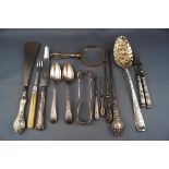 A collection of silver flatware and other items,