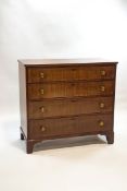 A 19th century mahogany chest of four long drawers with brass handles and bracket feet, 109.