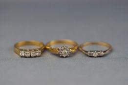 Three gold and diamond rings; comprising,