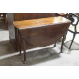 A George II mahogany oval drop leaf table on turned tapering legs and pad feet,