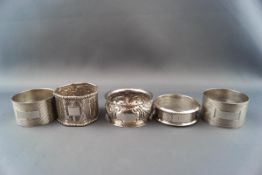 Five various napkin rings including two hallmarked examples,