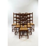 A set of six modern oak ladderback dining chairs with rush seats