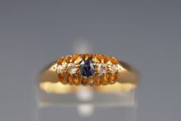 An early 20th century 18ct gold, sapphire and diamond five stone ring, Birmingham 1919, size O, 3.
