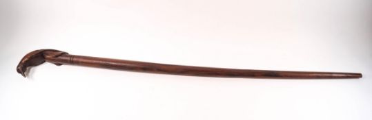 A wooden walking stick,