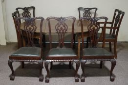 A set of seven George III style mahogany dining chairs,