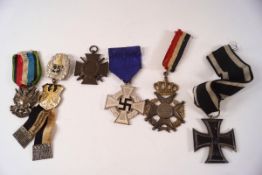 A small collection of six German medals, including a WWI Iron cross,