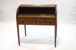 An Edwardian mahogany roll top desk,