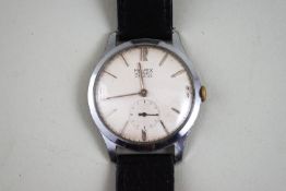 Majex, a gentleman's vintage stainless steel round wrist watch, white dial with baton numerals,
