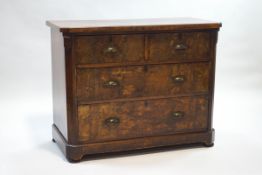 A Continental walnut chest of two short and two long drawers,