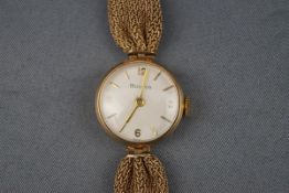 Bulova, a lady's 9ct gold round bracelet watch, circa 1963,