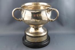 An early 20th century silver bowl, with three handles on flared foot, engraved "Taunton Motor Club,