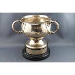 An early 20th century silver bowl, with three handles on flared foot, engraved "Taunton Motor Club,