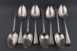 Two composite sets of four George III and Victorian table spoons,