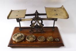 A set of early 20th century Postal scales and weights,