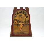 A painted wood 'Wimbledon Tennis Club' sign with applied figure on the tennis court, 61cm high x 41.