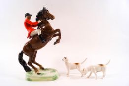 A Beswick model of a Huntsman on a rearing horse, model no.