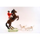 A Beswick model of a Huntsman on a rearing horse, model no.