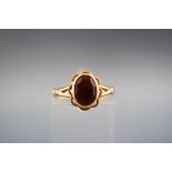 A single stone garnet ring. Stamped 9ct. Gross weight: 2.