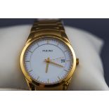 A Gentleman's Pulsar wristwatch with gold coloured bracelet and fold over clasp.