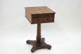A George IV mahogany work table with two drawers to tone side and two faux drawers to the other,