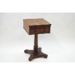 A George IV mahogany work table with two drawers to tone side and two faux drawers to the other,