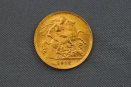 A 1912 George V half-Sovereign coin. 19.3 mm diameter. Gross weight: 3.