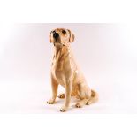 A Beswick fireside model of a Golden Labrador, model 2314, printed and impressed factory marks,