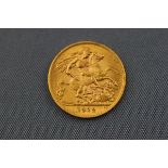 A 1912 George V half-Sovereign coin. 19.3mm diameter. 4.