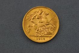 A 1912 George V half-Sovereign coin. 19.3mm diameter. 4.