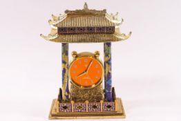 A Pagoda style clock, with gilt and cloisonne decoration, 8 day, 15 jewel movement, with alarm,