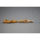 A collection of two bar brooches (boxed) : One of filigree curved bar design set with graduated