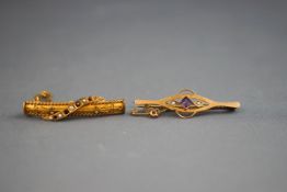 A collection of two bar brooches (boxed) : One of filigree curved bar design set with graduated
