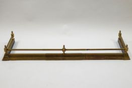 A 19th century brass adjustable fender,