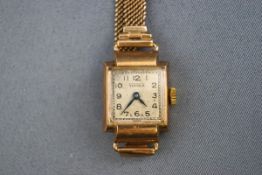 A 9 carat gold ladies wristwatch.