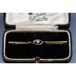 A stamped 15 carat bar brooch in fitted case,