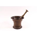 An 18th century bronze pestle and mortar,