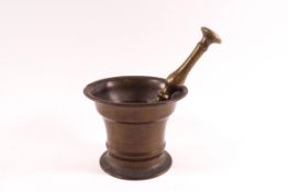 An 18th century bronze pestle and mortar,