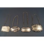 Four assorted silver decanter labels, titled Whiskey, sherry, Gin and Port, 1.