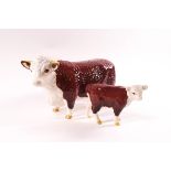 A Beswick Hereford Bull, Champion of Champions, printed marks, and a Beswick Hereford calf,