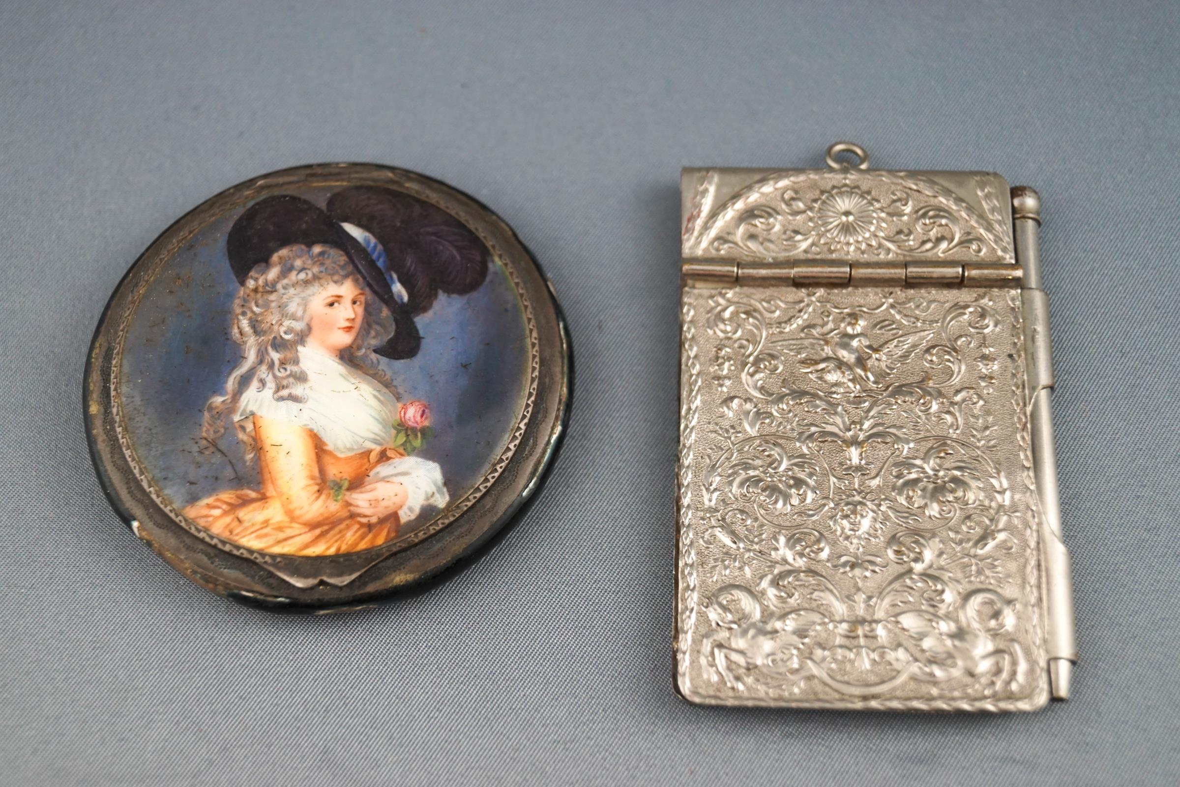 A silver powder compact, the top enamelled with a portrait of Georgina, Duchess of Devonshire,