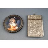A silver powder compact, the top enamelled with a portrait of Georgina, Duchess of Devonshire,