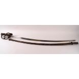 A 20th century cavalry officer's sabre and scabbard, with decorative hilt and engraved monogram,
