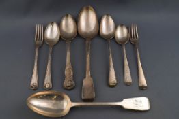 A collection of silver flatware comprising a silver spoon and fork, London 1893 by William Hutton,