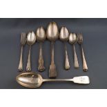 A collection of silver flatware comprising a silver spoon and fork, London 1893 by William Hutton,