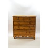 A Victorian pine chest of two short over three long drawers,