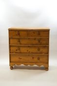 A Victorian pine chest of two short over three long drawers,