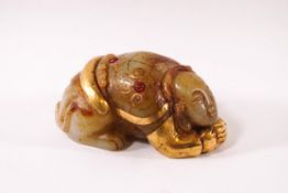 A Chinese carved green hardstone figure of a half animal/half Buddha,