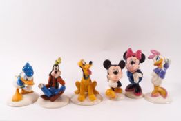 Six Royal Doulton 70th anniversary Mickey Mouse figures: Minnie Mouse, Mickey Mouse, Goofy,