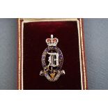 A Garrards Royal Horse Artillery diamond set brooch in fitted case.