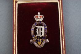 A Garrards Royal Horse Artillery diamond set brooch in fitted case.